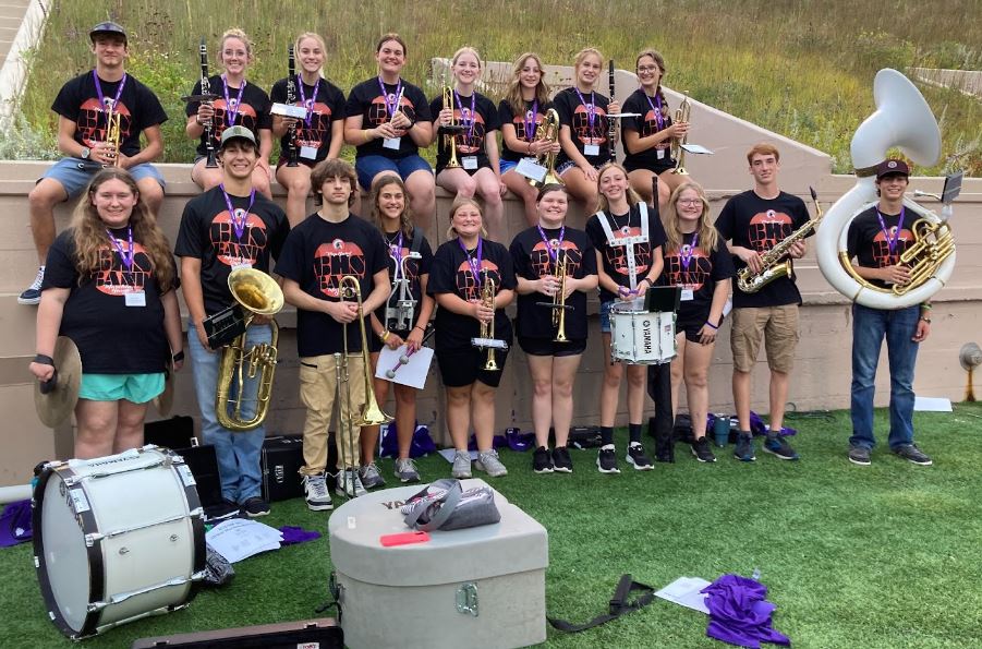 The band student get ready for their first 3-hour practice. From left to right, the front row: Eve Fuller, Asher Zimmer, Ethan Fay, Autumn Lorenz, Emilie Sadler, Maddie Black, Abby Gantz, Ally Otte, Mason Thompson, and Sawyer Zimmer. Back row: Evan Blue, Morgan Weston, Carlee Domann, Sophie Easter, Emry Hardin, Zelma Krone, Jayden Brooks, and Kerrigan Hubert.